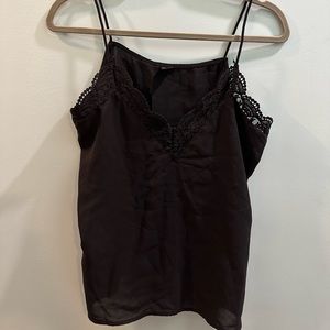 Super cute easy to wear flowyblack tank top with lace accent